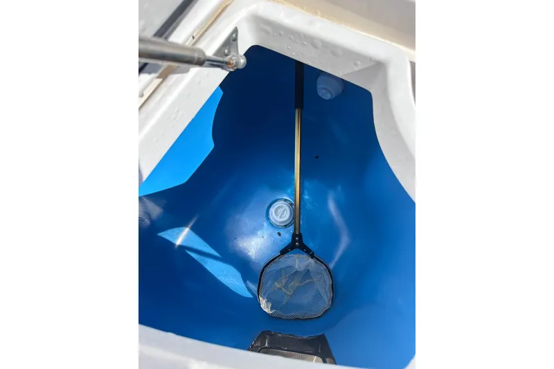 Slide: The Image of Livewell with net inside 2020 Intrepid 409 Valor boat. - 58