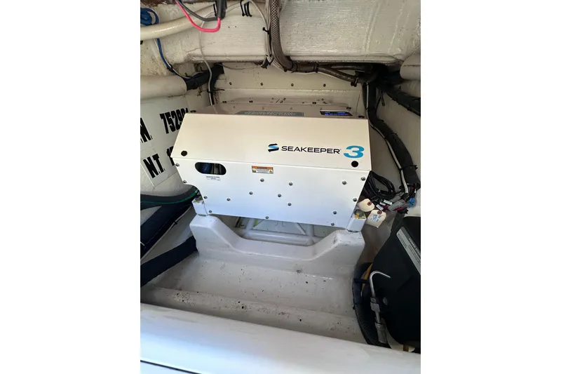Slide: The Image of Seakeeper 3 stabilizer in 2020 Intrepid 409 Valor boat engine room. - 62
