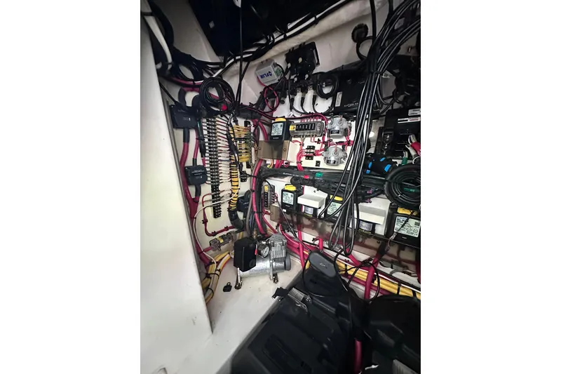 Slide: The Image of Electrical wiring and components inside a 2020 Intrepid 409 Valor boat. - 66