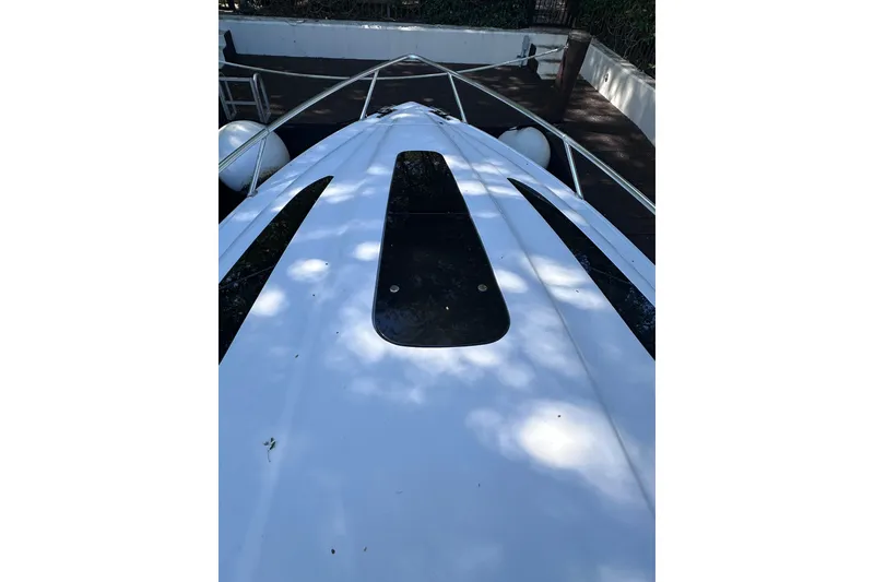 Slide: The Image of 2020 Intrepid 409 Valor boat deck with sleek design and railing. - 72