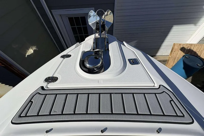 Slide: The Image of 2023 Monterey 305SS Super Sport boat deck with anchor and sleek design. - 20