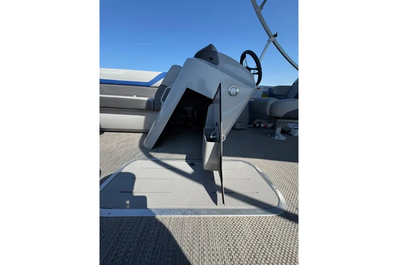 Slide: The Image of 2022 Bennington SX 23 Quad Bench interior with steering console and seating. - 15