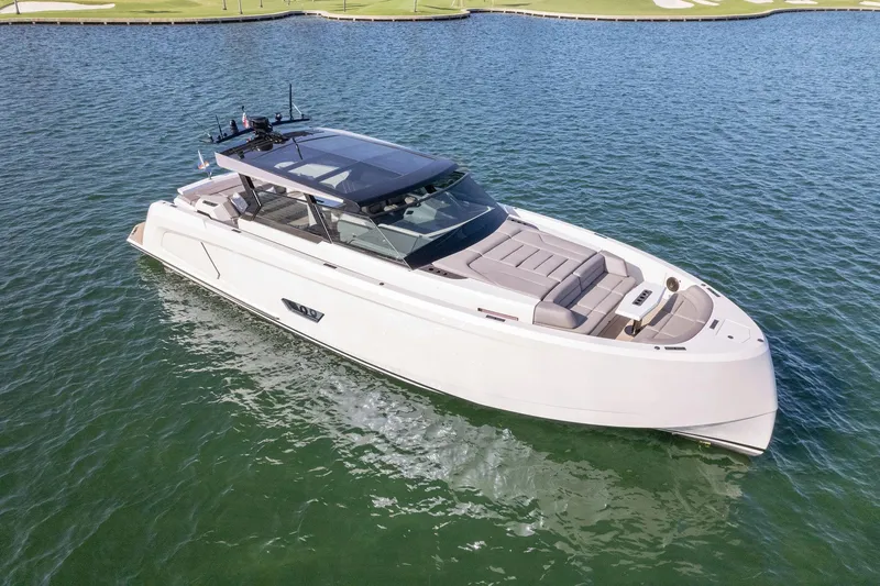 Slide: The Image of 2022 Vanquish Yachts VQ58 luxury yacht on calm water. - 17