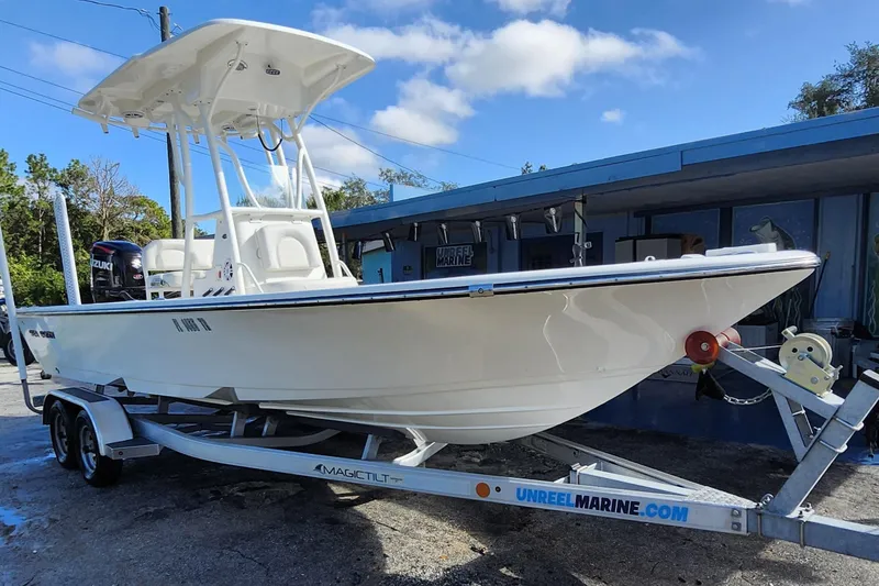 The Image of 2023 Sea Born FX22 Bay boat on trailer at Unreel Marine dealership. - 0