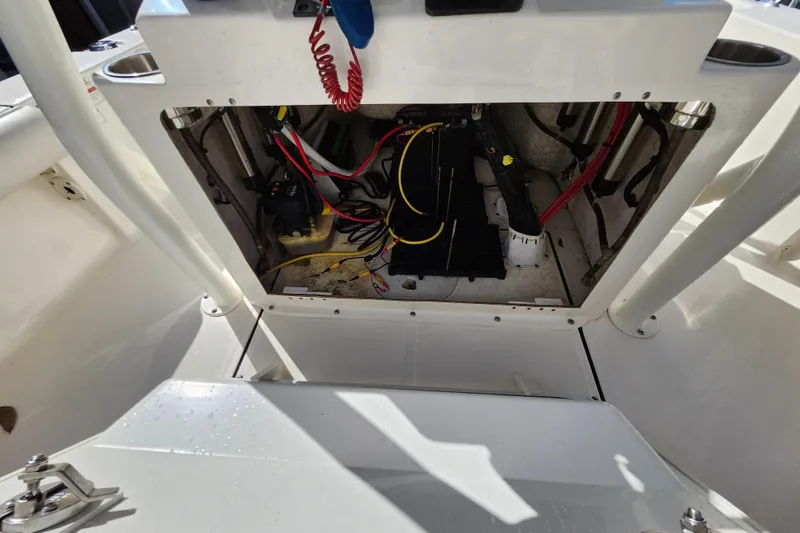 Slide: The Image of 2023 Sea Born FX22 Bay boat interior wiring and battery compartment. - 36
