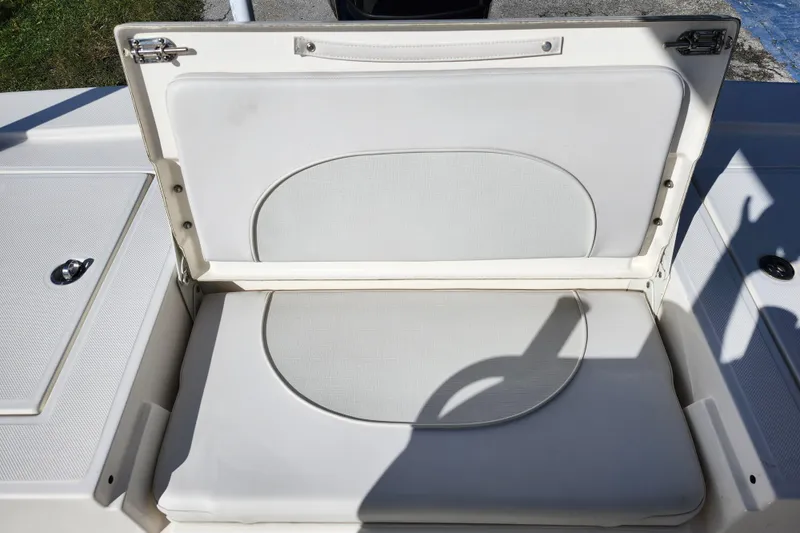 Slide: The Image of 2023 Sea Born FX22 Bay boat seat with open storage compartment. - 43