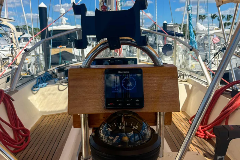 Slide: The Image of Cockpit view of 1991 Oyster LW48 sailboat with navigation instruments and compass. - 35