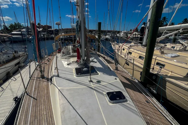 Slide: The Image of Sailboat docked at marina, Oyster LW48, 1991 model, sunny day, clear blue sky. - 55