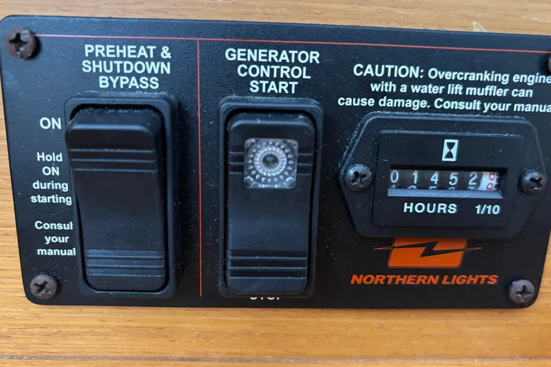 Slide: The Image of Control panel of a 2018 Jeanneau Sun Odyssey 389 with generator hour meter. - 14
