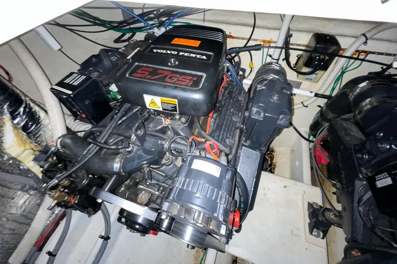 Slide: The Image of Engine compartment of 2000 Cruisers Yachts 3375 Express with Volvo Penta 5.7 GSi engine. - 35