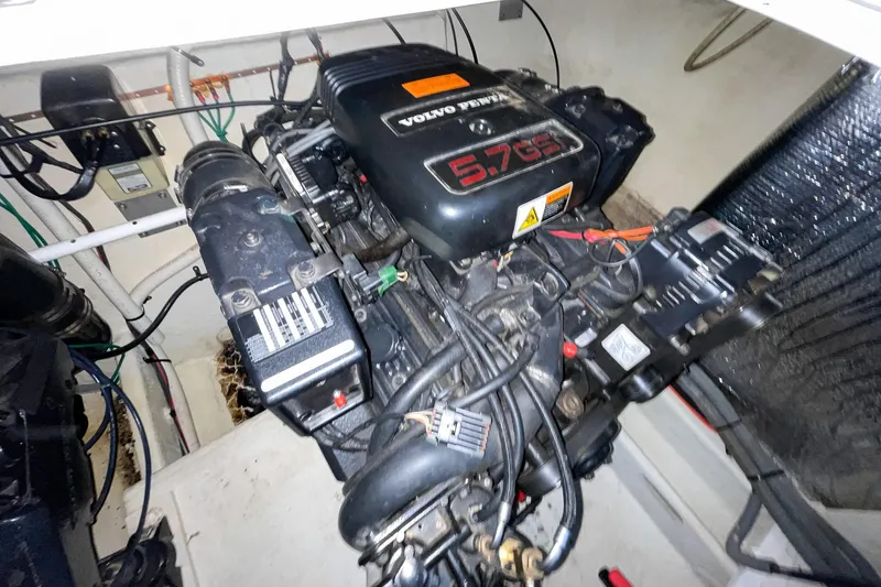 Slide: The Image of Engine compartment of 2000 Cruisers Yachts 3375 Express with Volvo Penta 5.7 GSi engine. - 36