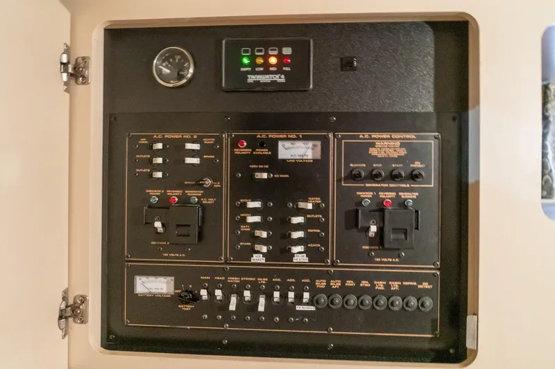 Slide: The Image of Electrical control panel on a 2000 Cruisers Yachts 3375 Express boat. - 33