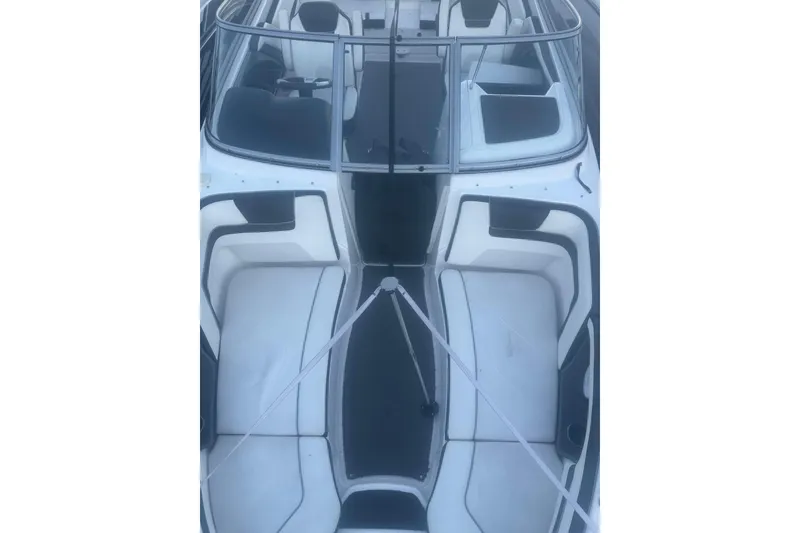 Slide: The Image of 2015 Yamaha Boats AR240 HO interior with white seating and sleek design. - 2