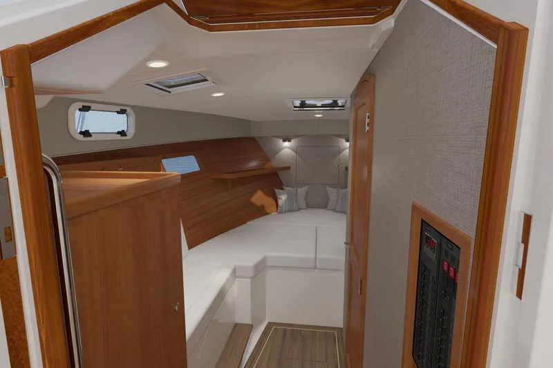 Slide: The Image of Helm of 2026 MJM 38R boat with navigation screens and controls. - 12