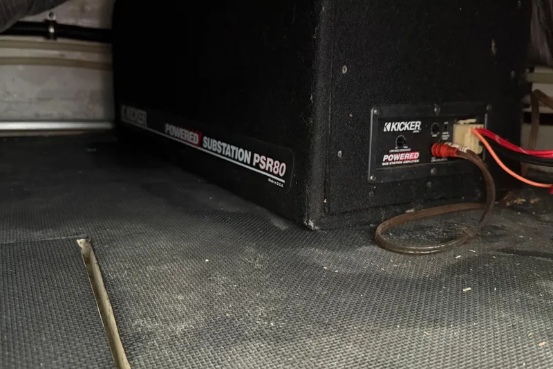 Slide: The Image of Interior of a 1999 Cobalt 293 boat, featuring a compact cabin space. - 45