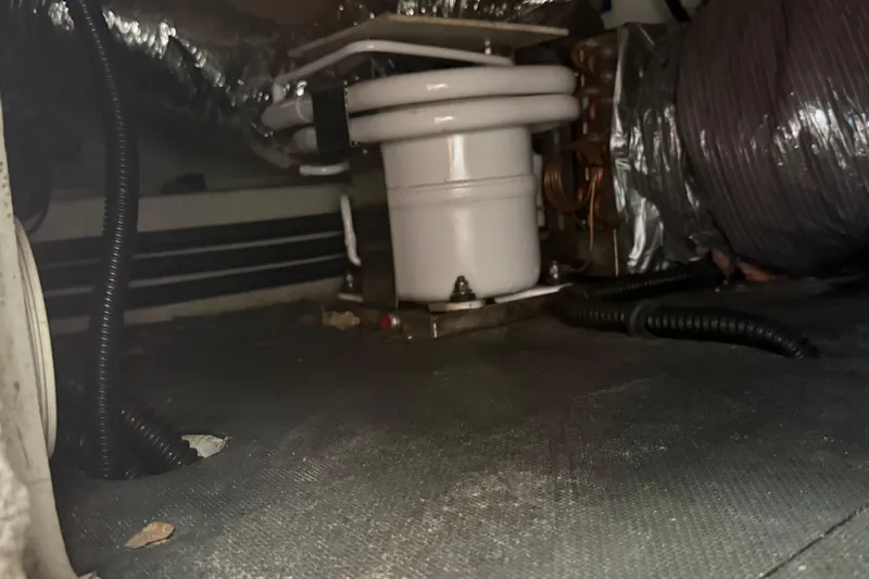 Slide: The Image of Boat toilet in a 1999 Cobalt 293, compact and functional design. - 46