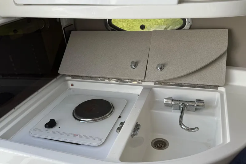 Slide: The Image of Kicker Powered Substation PSR80 in 1999 Cobalt 293 boat interior. - 48