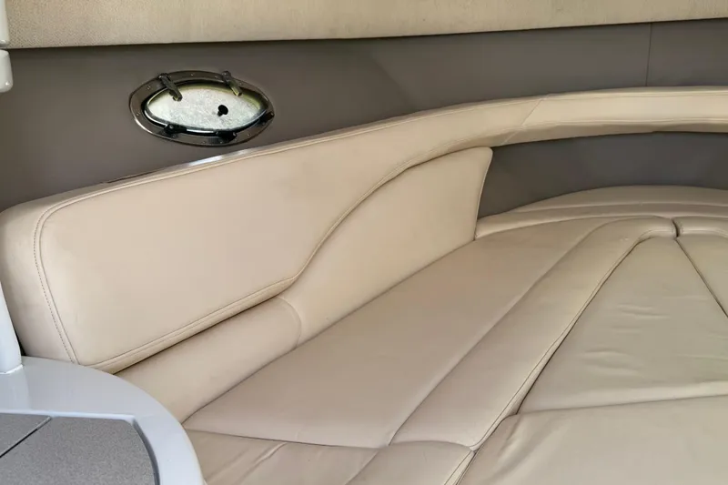 Slide: The Image of Compact kitchen area in a 1999 Cobalt 293 boat with stove and sink. - 53