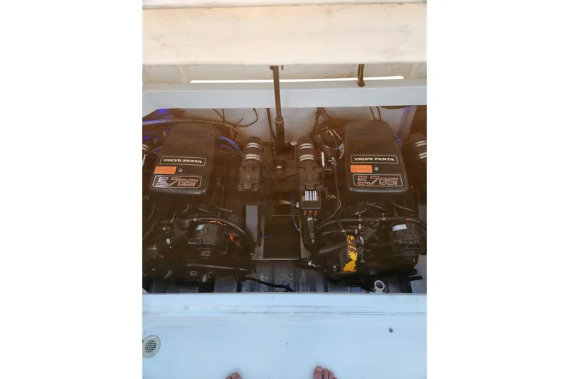 Slide: The Image of Open mini fridge and storage on 1999 Cobalt 293 boat deck. - 61