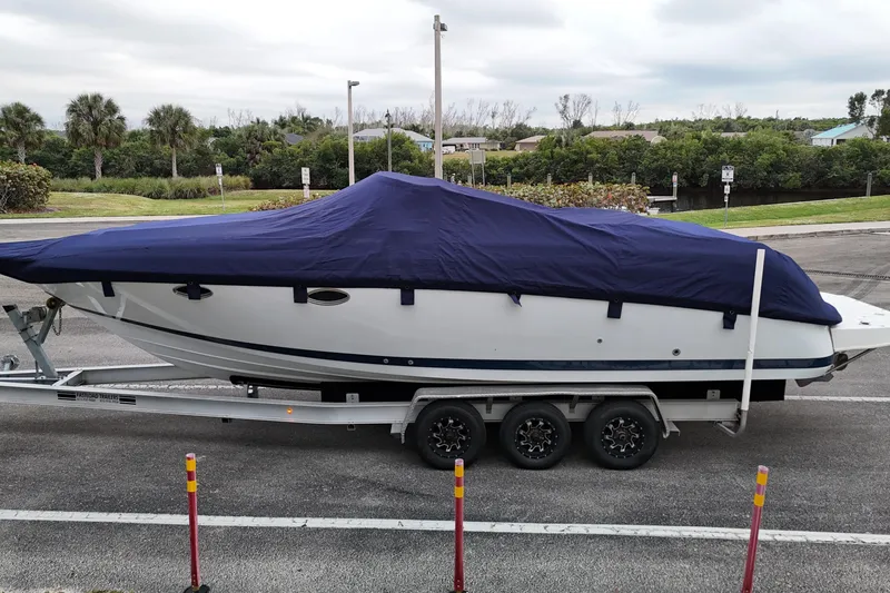 Slide: The Image of Engine compartment of a 1999 Cobalt 293 boat, showing wiring and components. - 63