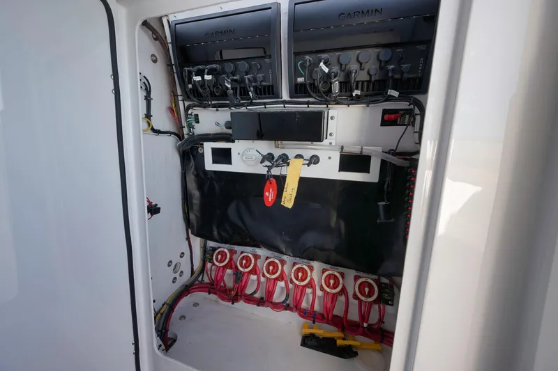 Slide: The Image of Electrical panel of 2024 Bahama 41 RD boat with Garmin equipment and wiring. - 21