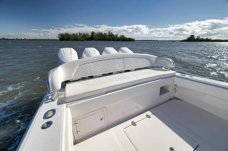 Slide: The Image of 2024 Bahama 41 RD boat with luxurious seating, cruising on a sunny day. - 17