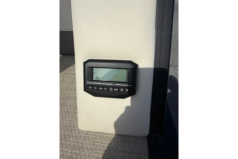 Slide: The Image of Alera M23 2026 audio control panel on beige surface. - 21