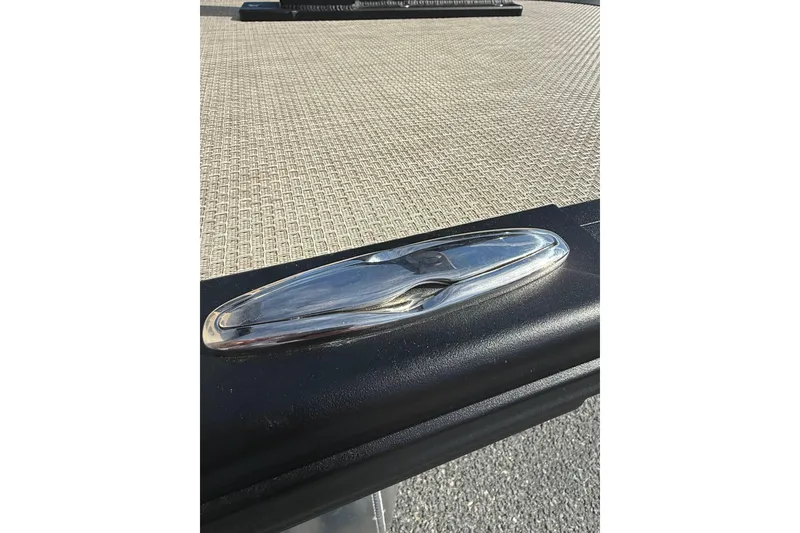 Slide: The Image of Alera M23 2026 boat cleat on textured deck surface. - 22