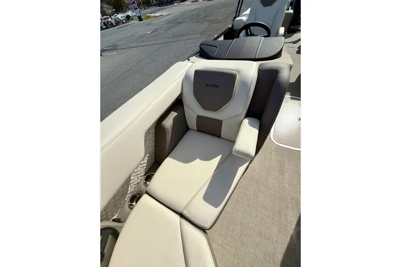Slide: The Image of Luxurious seating on Alera M23 boat, 2026 model, featuring beige and gray upholstery. - 8
