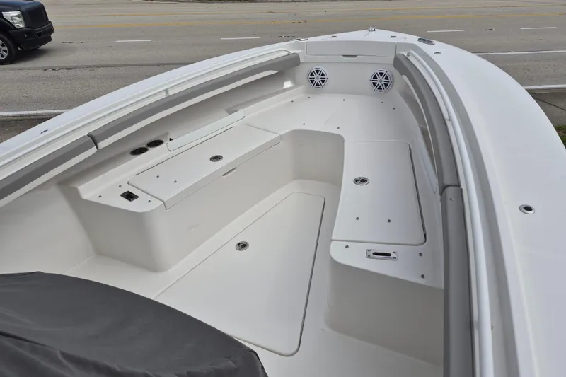 Slide: The Image of 2026 Regulator 23 boat interior with seating and storage compartments. - 15