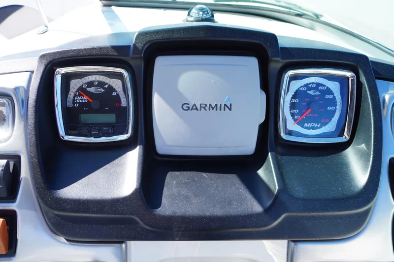Slide: The Image of Dashboard of 2014 Chaparral 287 SSX with Garmin display and gauges. - 17