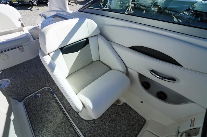 Slide: The Image of 2014 Chaparral 287 SSX boat interior with plush seating and modern design. - 22