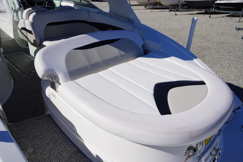 Slide: The Image of 2014 Chaparral 287 SSX boat interior with white seating and modern design. - 51