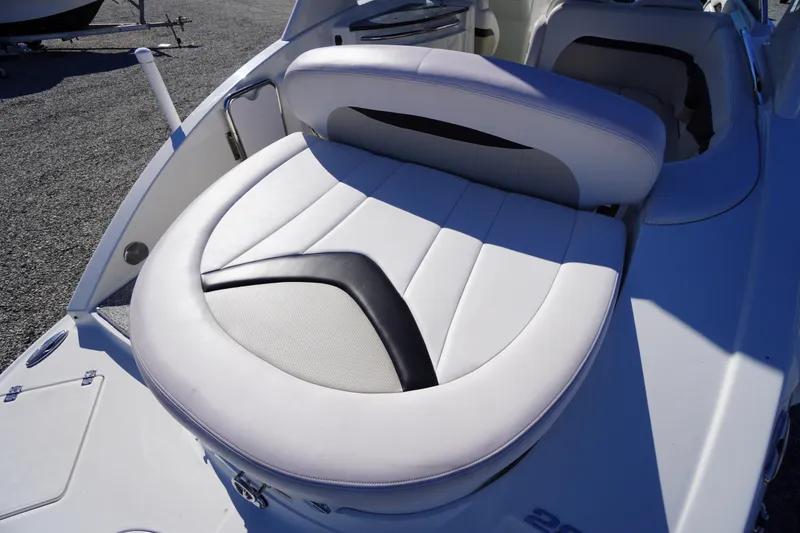 Slide: The Image of 2014 Chaparral 287 SSX boat with stylish white seating and sleek design. - 52