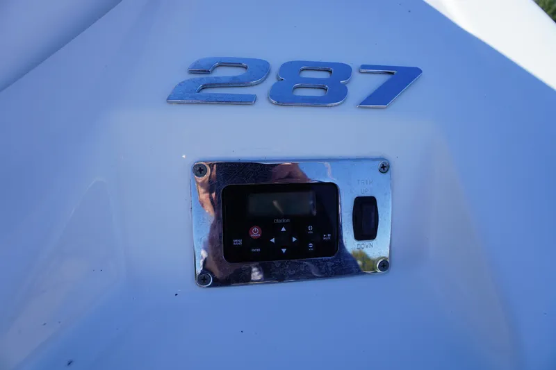 Slide: The Image of 2014 Chaparral 287 SSX boat control panel with model number. - 57