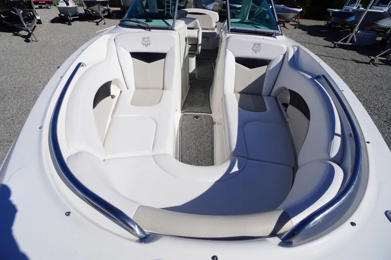 Slide: The Image of 2014 Chaparral 287 SSX boat interior with spacious seating and sleek design. - 8