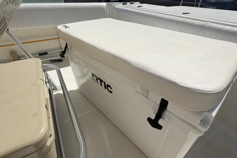 Slide: The Image of Hydra-Sports 2500 CC 2000 boat interior with RTIC cooler and seating. - 12