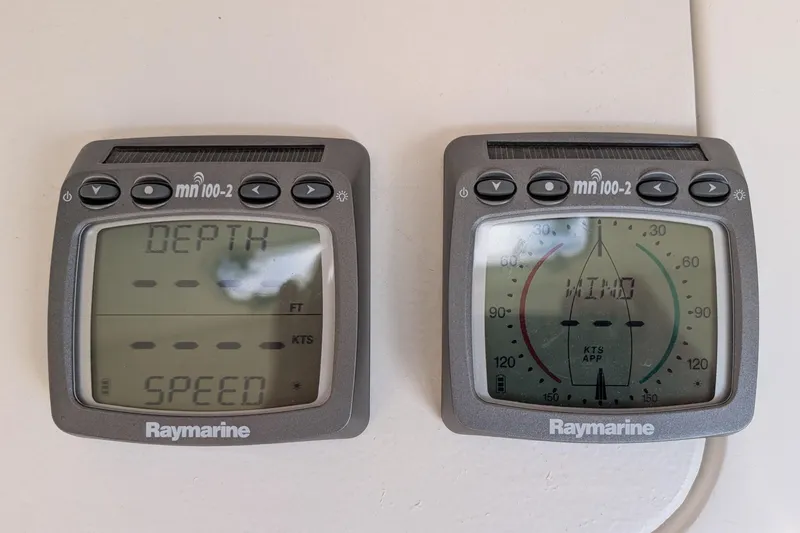 Slide: The Image of Raymarine mn100-2 displays on 2016 J Boats J 95, showing depth and wind data. - 11