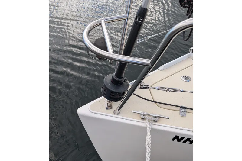 Slide: The Image of 2016 J Boats J 95 bow detail with stainless steel fittings and rope, on water. - 3