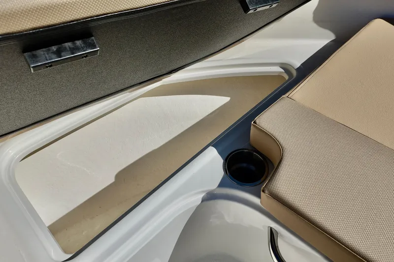 Slide: The Image of 2025 Bayliner VR4 Bowrider OB interior storage and seating detail. - 9