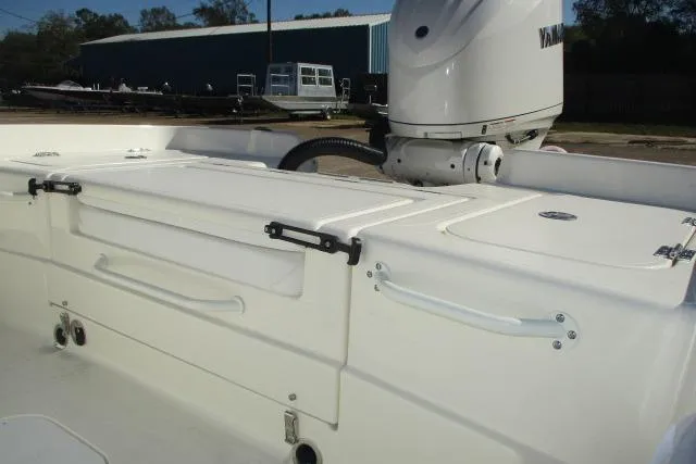 Slide: The Image of 2026 Skeeter SX2350 boat with Yamaha engine, featuring a spacious deck and storage compartments. - 14