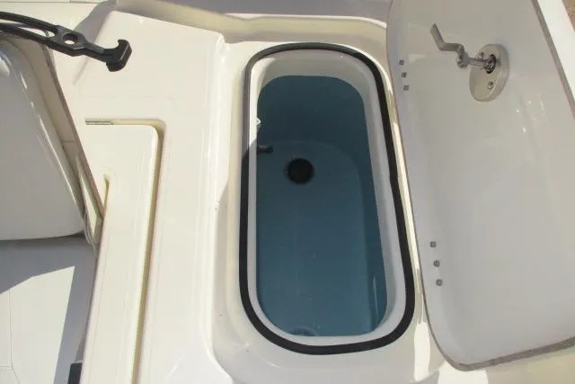 Slide: The Image of Open livewell on 2026 Skeeter SX2350 boat, showcasing interior design. - 4