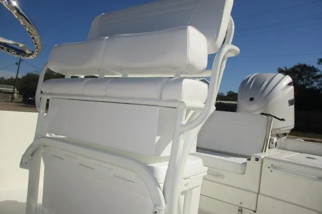 Slide: The Image of 2026 Skeeter SX2350 boat with white seating and Yamaha outboard motor. - 8
