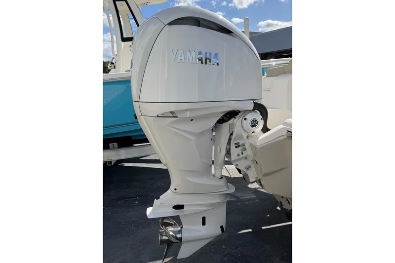 Slide: The Image of 2026 Key West 239 FSR boat with Yamaha outboard motor, side view. - 10