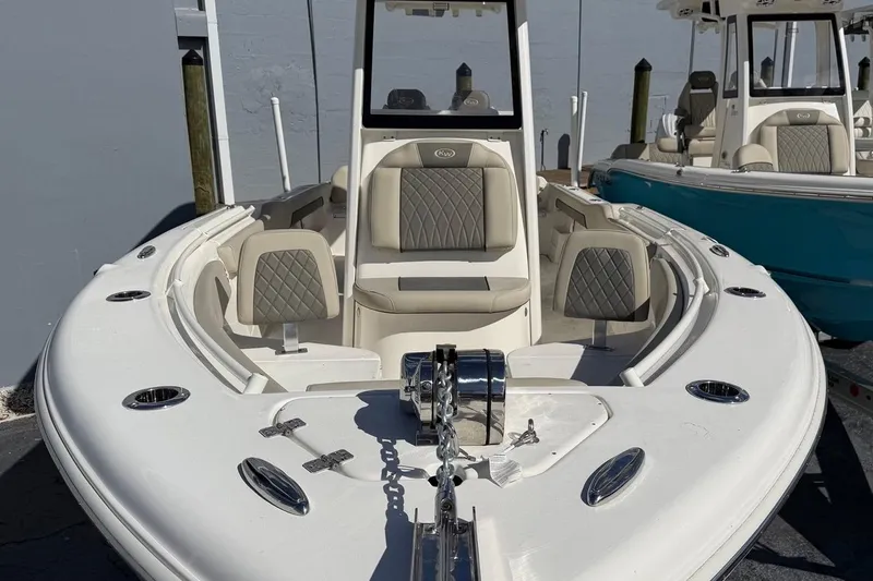 Slide: The Image of 2026 Key West 239 FSR boat with sleek design and comfortable seating. - 12