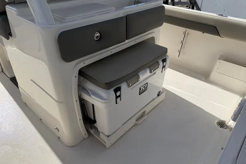 Slide: The Image of 2026 Key West 239 FSR boat interior with built-in cooler storage. - 21