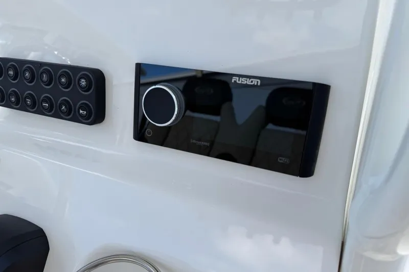 Slide: The Image of Control panel on 2026 Key West 239 FSR boat dashboard with Fusion audio system. - 29