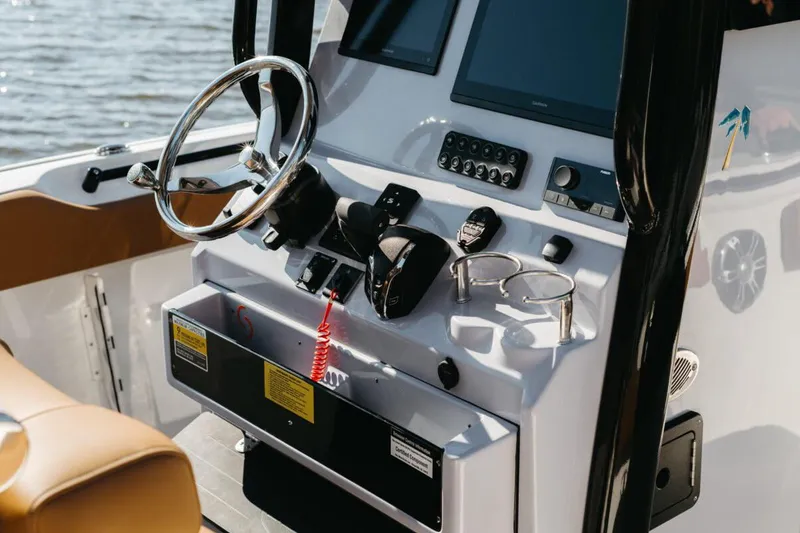 Slide: The Image of 2026 Key West 239 FSR boat on trailer, displayed outdoors under clear sky. - 4