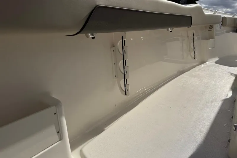 Slide: The Image of Interior view of 2026 Key West 239 FSR boat, showcasing seating and storage. - 44
