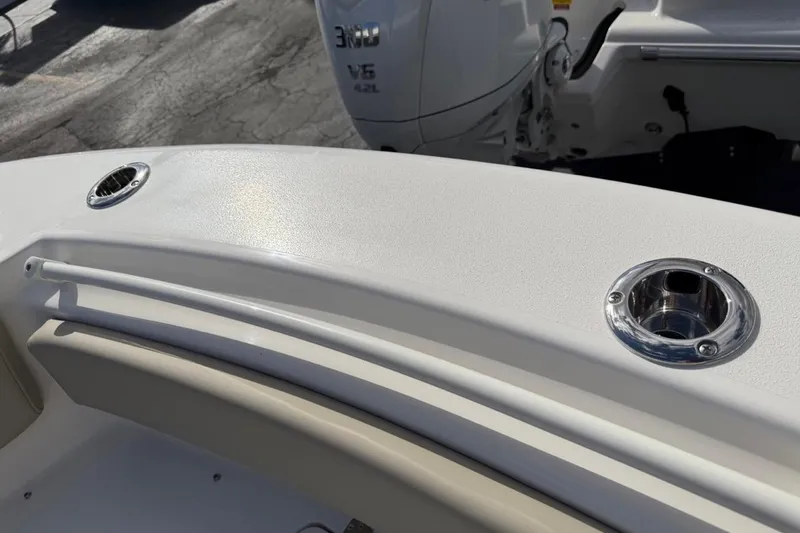 Slide: The Image of 2026 Key West 239 FSR boat deck with rod holders and Yamaha V6 engine. - 52